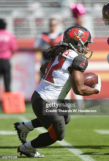 Jacquizz Rodgers of the Tampa Bay Buccaneers carries the ball against the San Francisco 49ers during the first quarter of an NFL football game at...