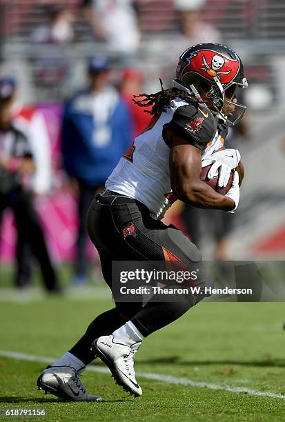Jacquizz Rodgers of the Tampa Bay Buccaneers carries the ball against the San Francisco 49ers during the first quarter of an NFL football game at...