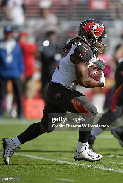 Jacquizz Rodgers of the Tampa Bay Buccaneers carries the ball against the San Francisco 49ers during the first quarter of an NFL football game at...