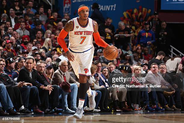 Carmelo Anthony of the New York Knicks dribbles the ball up court against the Cleveland Cavaliers on October 25, 2016 at Quicken Loans Arena in...