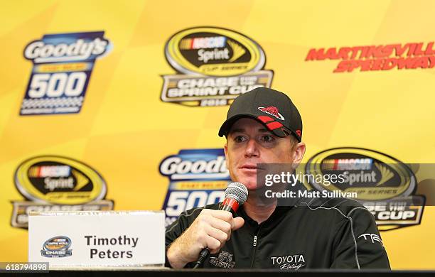 Timothy Peters, driver of the Red Horse Racing Toyota, speaks to the media at Martinsville Speedway on October 28, 2016 in Martinsville, Virginia.