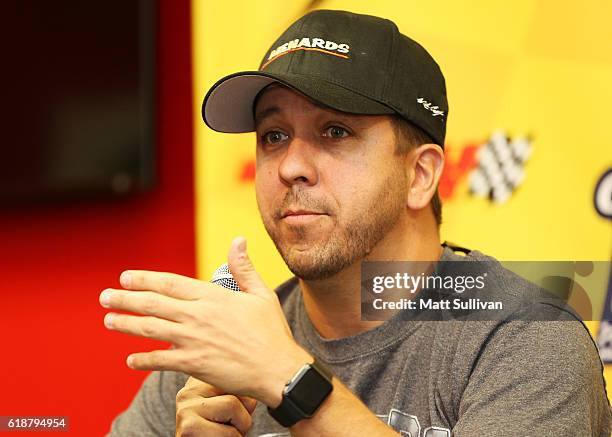 Matt Crafton, driver of the Ideal Door/Menards Toyota, speaks to the media at Martinsville Speedway on October 28, 2016 in Martinsville, Virginia.