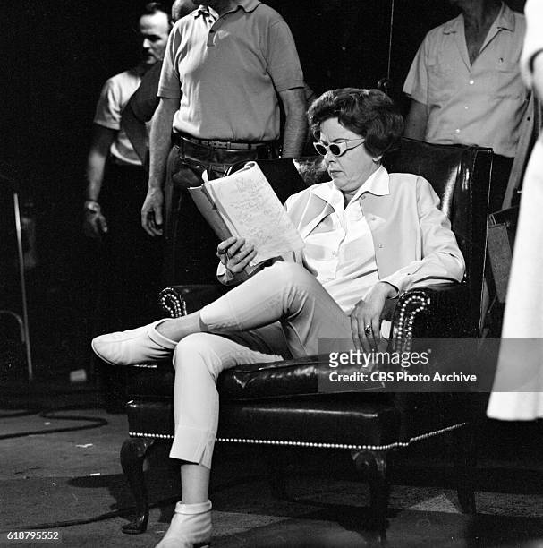 Director, Ida Lupino looks over the script of THE TWILIGHT ZONE episode, "The Masks." Image dated May 23, 1963. Original broadcast date, March 20,...