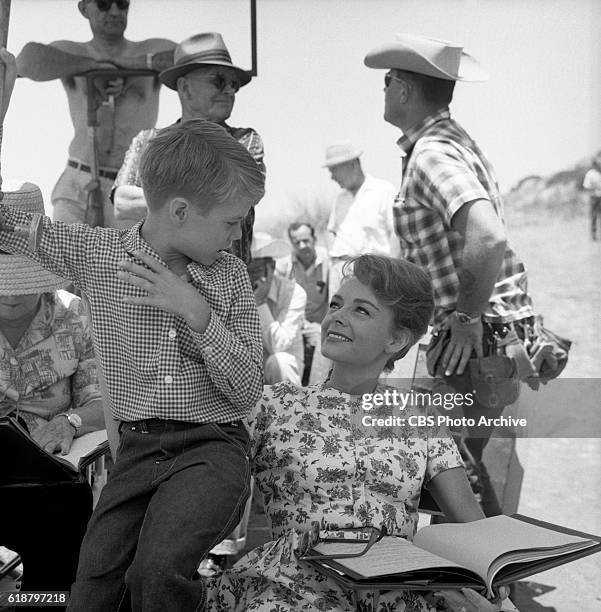 Jon Provost with June Lockhart behind the scenes of the CBS television show, Lassie episode, Lassie to the Rescue. Image dated June 25, 1963....