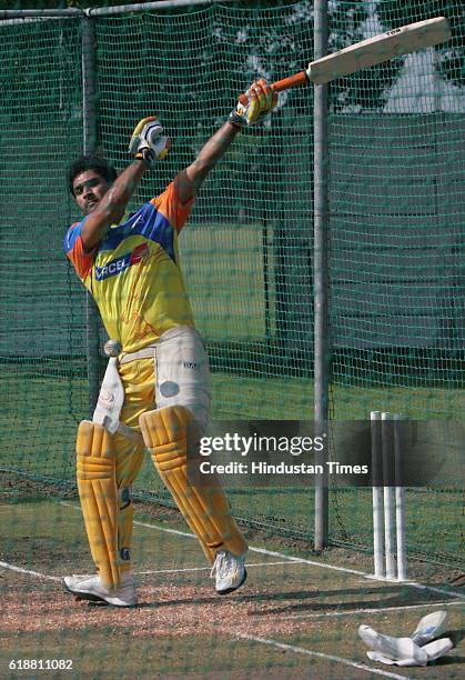 Chennai Super King's captain MS Dhoni bats during the team's practice session at Ballville, Cape Town