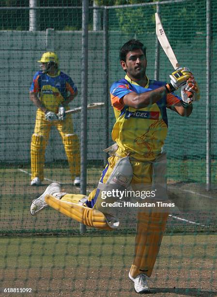 Chennai Super King's captain MS Dhoni bats during the team's practice session at Ballville, Cape Town