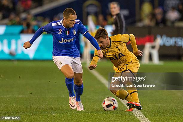 Will Miller of the Tottenham Hot Spurs FC controls the ball in front of Pol Mikel Lirola Kosok of Juventus FC during the International Champions Cup...