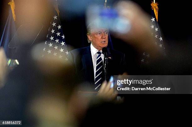 Republican presidential nominee Donald Trump speaks at a rally at the Raddison Hotel on October 28, 2016 in Manchester, New Hampshire. Trump is in a...