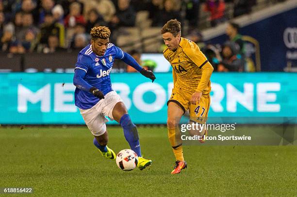 Will Miller of the Tottenham Hot Spurs FC and Mario Lemina of Juventus FC contest the ball during the International Champions Cup between Juventus FC...