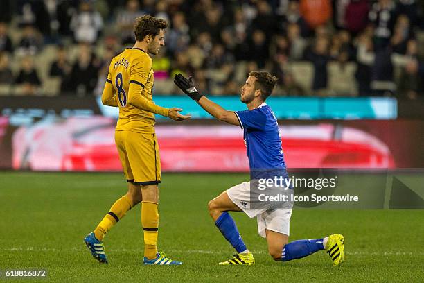 Ryan Mason of the Tottenham Hot Spurs FC and Miralem Pjanic of Juventus FC have a moment after an aggressive tackle during the International...