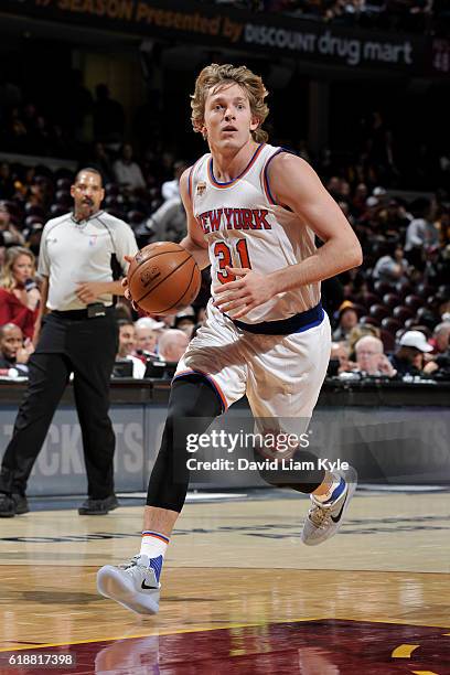 Ron Baker of the New York Knicks drives to the basket against the Cleveland Cavaliers on October 25, 2016 at Quicken Loans Arena in Cleveland, Ohio....