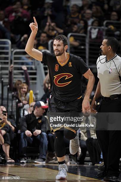 Kevin Love of the Cleveland Cavaliers celebrates a three point basket and runs up court against the New York Knicks on October 25, 2016 at Quicken...