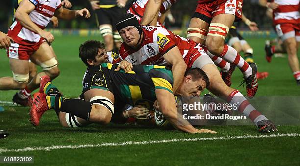 Louis Picamoles of Northampton dives over for the first try during the Aviva Premiership match between Northampton Saints and Gloucester Rugby at...
