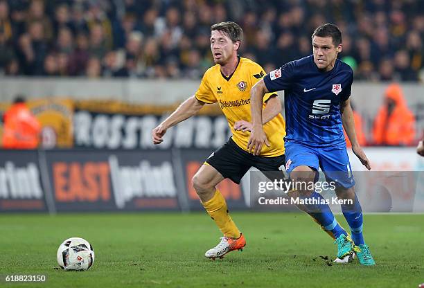 Mirko Boland of Braunschweig battles for the ball with Andreas Lambertz of Dresden during the Second Bundesliga match between SG Dynamo Dresden and...