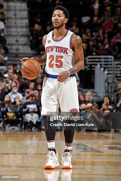 Derrick Rose of the New York Knicks dribbles the ball up court against the Cleveland Cavaliers on October 25, 2016 at Quicken Loans Arena in...