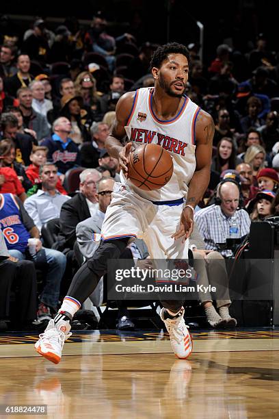 Derrick Rose of the New York Knicks dribbles the ball against the Cleveland Cavaliers on October 25, 2016 at Quicken Loans Arena in Cleveland, Ohio....