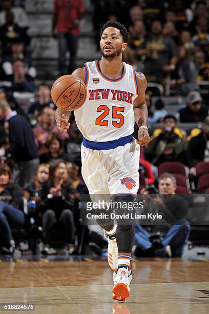 Derrick Rose of the New York Knicks dribbles the ball up court against the Cleveland Cavaliers on October 25, 2016 at Quicken Loans Arena in...