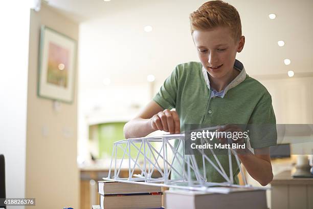 Boy Making Model Kit 70,614 Kid Model Stock Photos, High-Res Pictures, and Images - Getty Images