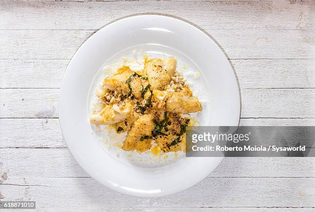 italian risotto made of rice and perch fish - perch foto e immagini stock