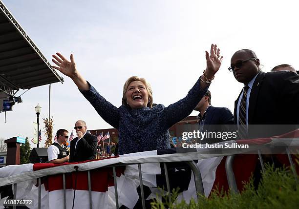 Democratic presidential nominee former Secretary of State Hillary Clinton greets supporters during a campaign rally on October 28, 2016 in Cedar...