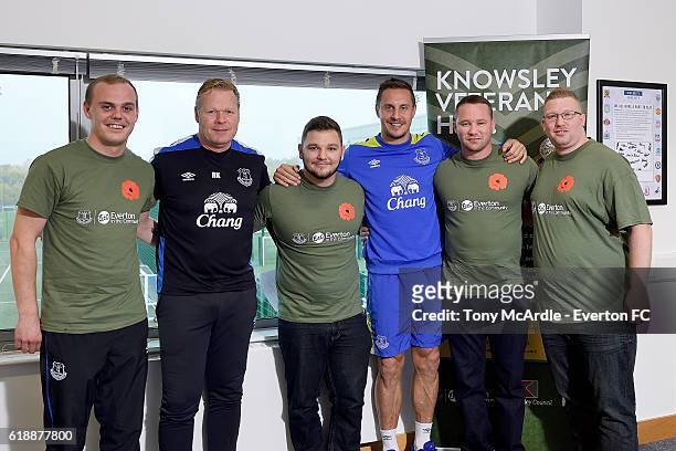 Phil Jagielka and Ronald Koeman attend an Everton In The Community event at Finch Farm on October 28, 2016 in Halewood, England.