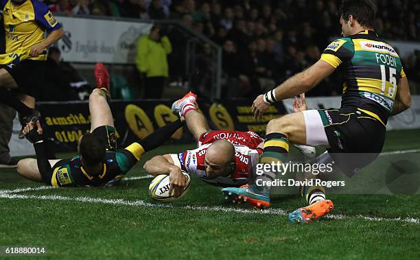 Charlie Sharples of Gloucester dives over for their second try during the Aviva Premiership match between Northampton Saints and Gloucester Rugby at...