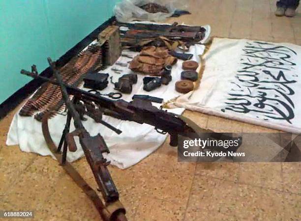 Algeria - Undated photo shows weapons used by Islamist militants who took over a gas plant in In Amenas, Algeria, taking many foreign workers...