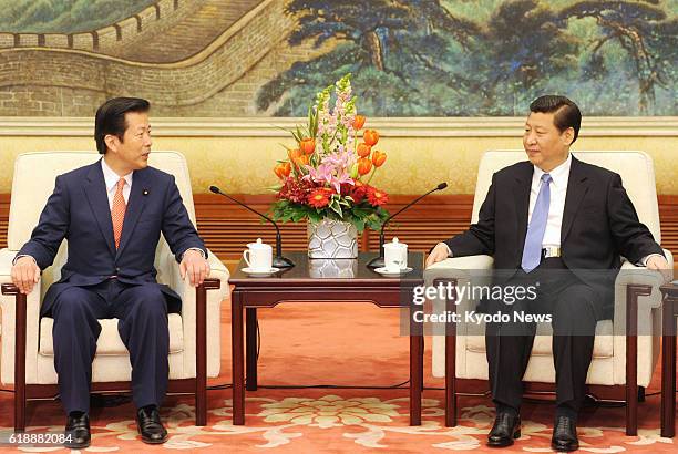 China - New Komeito party leader Natsuo Yamaguchi holds talks with Chinese Communist Party leader Xi Jinping, the country's president-in-waiting, at...