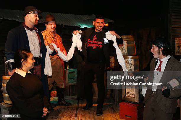 Colin Thomas General Manager of The San Francisco Dungeon celebrates the grand opening of its new 'Escape Alcatraz' Drop Ride and show with a prison...