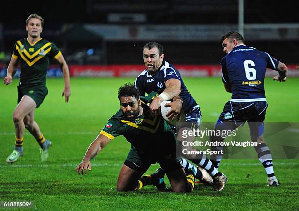 Australia's Sam Thaiday is tackled by Scotland's Kane Linnett during the Four Nations match between the Australian Kangaroos and Scotland at...