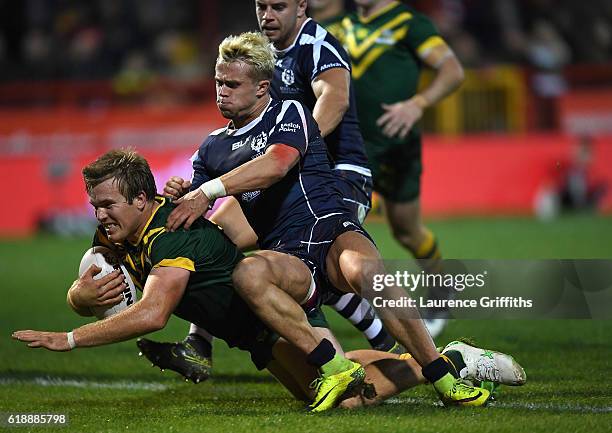 Jake Trbojevic of Australia powers his way to a second half try during the Four Nations match between the Australian Kangaroos and Scotland at KCOM...