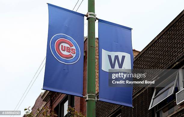 Cubs banner and 'W' banner hangs on Clark Street outside Wrigley Field, home of the Chicago Cubs baseball team to celebrate the Cubs' World Series...