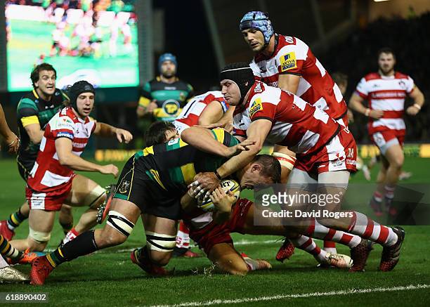 Louis Picamoles of Northampton powers forward to score the first try during the Aviva Premiership match between Northampton Saints and Gloucester...