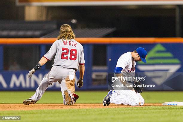 Washington Nationals left fielder Jayson Werth gets called out at second base and Daniel Murphy is called out, as Werth slid into New York Mets...