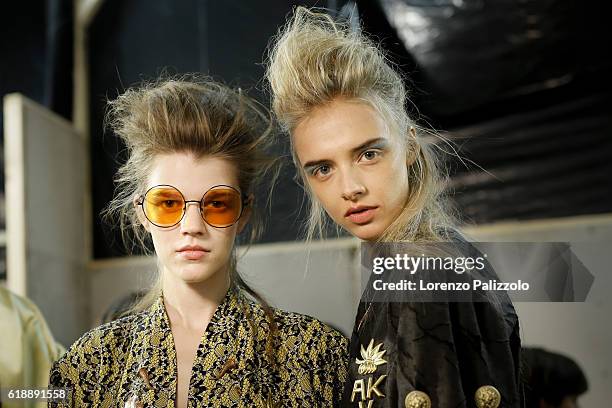 Models pose prior the Vivienne Westwood show as part of the Paris Fashion Week Womenswear Spring/Summer 2017 on October 1, 2016 in Paris, France.