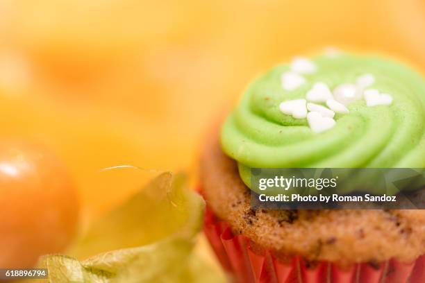 cupcake with with little hearts - gooseberry cake stock pictures, royalty-free photos & images