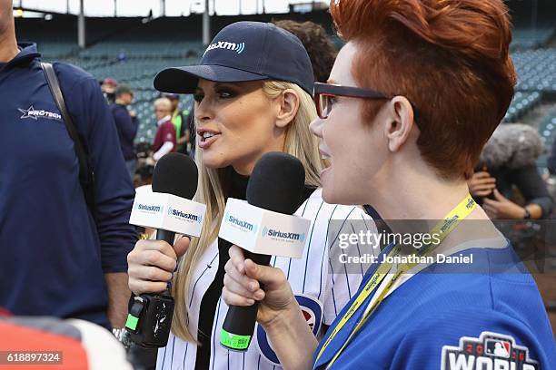 Jenny McCarthy and sister Lynette McCarthy watch batting practice before Game Three of the 2016 World Series between the Chicago Cubs and the...