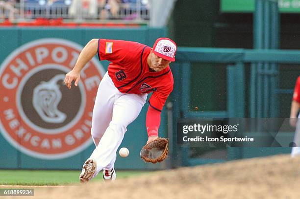 Washington Nationals shortstop Danny Espinosa fields a ground ball against the Milwaukee Brewers at Nationals Park in Washington, D.C. Where the...