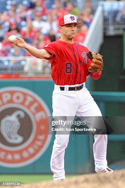 Washington Nationals shortstop Danny Espinosa fields a ground ball against the Milwaukee Brewers at Nationals Park in Washington, D.C. Where the...