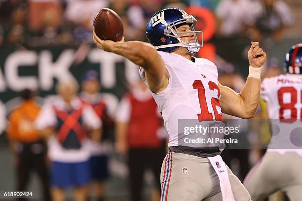 Quarterback Ryan Nassib of the New York Giants passes the ball against the New York Jets at MetLife Stadium on August 27, 2016 in East Rutherford,...