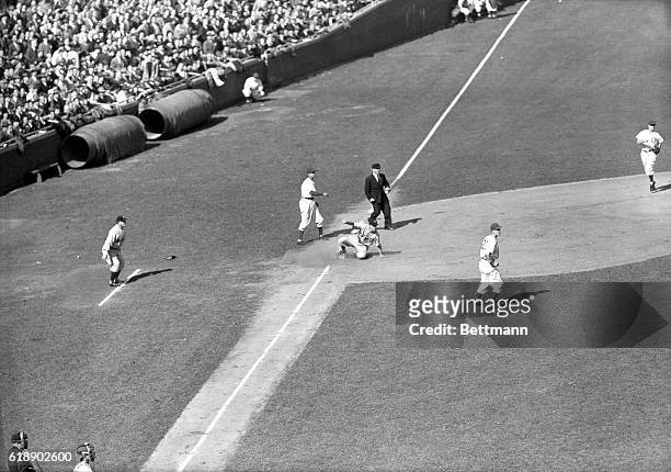 In the first inning of the fifth World Series game here today, Tigers leftfielder Greenberg hit to Hack, but Hack fumbled the ball and Mayo made...