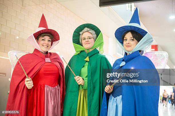 Cosplayers appear as Fairy Godmothers during day 1 of MCM London Comic Con at ExCel on October 28, 2016 in London, England.