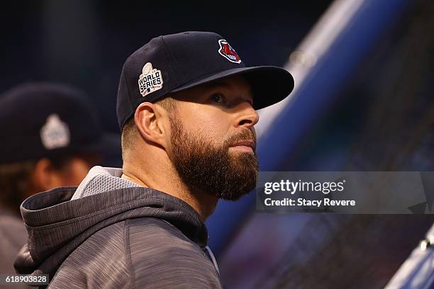 Cody Allen of the Cleveland Indians watches batting practice before Game Three of the 2016 World Series against the Chicago Cubs at Wrigley Field on...