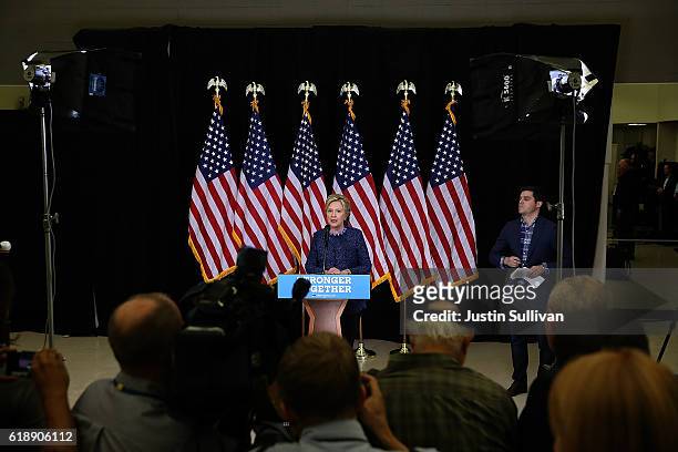 Democratic presidential nominee former Secretary of State Hillary Clinton speaks to reporters following a campaign rally at Roosevelt High School on...