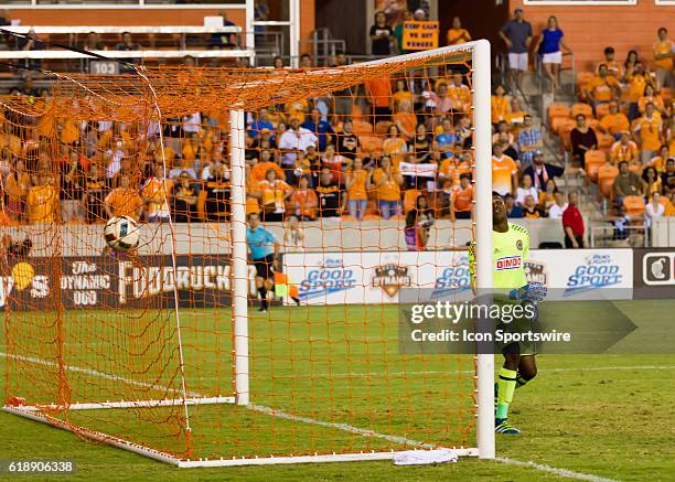 Philadelphia Union goalkeeper Andre Blake was unable to stop the free kick made by Houston Dynamo midfielder Cristian Maidana in the 94th minute...