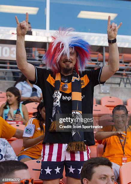 Houston Dynamo fan shows his patriotism during the MLS soccer match between Philadelphia Union and Houston Dynamo at BBVA Compass Stadium in Houston,...