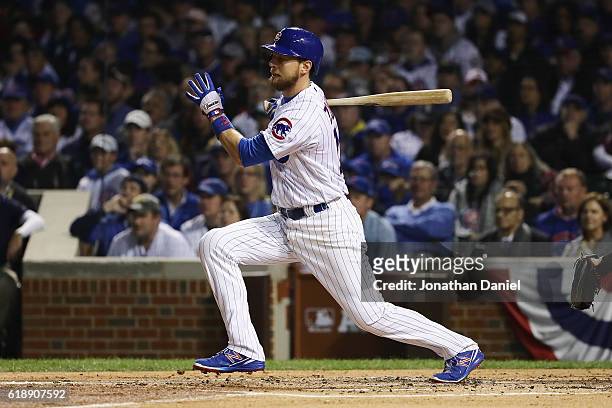 Ben Zobrist of the Chicago Cubs hits a single in the second inning against the Cleveland Indians in Game Three of the 2016 World Series at Wrigley...