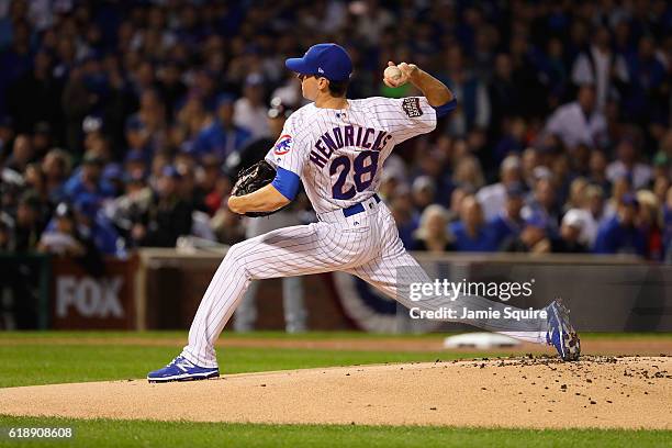 Kyle Hendricks of the Chicago Cubs pitches in the first inning against the Cleveland Indians in Game Three of the 2016 World Series at Wrigley Field...