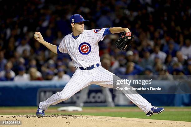 Kyle Hendricks of the Chicago Cubs pitches in the first inning against the Cleveland Indians in Game Three of the 2016 World Series at Wrigley Field...