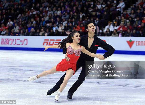 Shiyue Wang and Xinyu Liu of China compete in the Ice Dance Short Program during the ISU Grand Prix of Figure Skating Skate Canada International at...